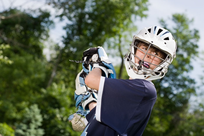 A boy playing base ball