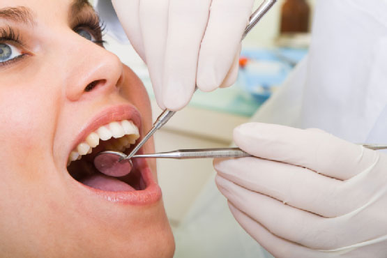 A women getting her dental checkup