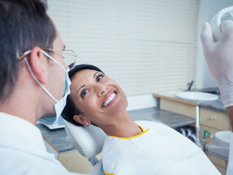 Patient smiling with doctor